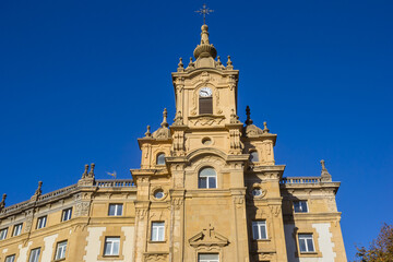 Fototapeta na wymiar Tower of a historic church building in San Sebastian