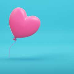 Pink balloon in heart shape for valentine`s day on bright blue background in pastel colors