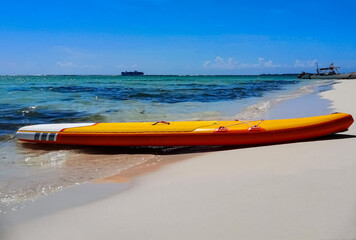 Fototapeta premium Yellow Sub on lies on the shores of the Caribbean. Recreation and sports.