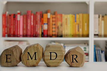 Eye Movement Desensitization and Reprocessing psychotherapy treatment concept. Letters EMDR written...