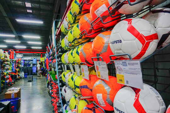 ULUBERIA, HOWRAH, WEST BENGAL / INDIA - 18TH MARCH 2018 : Colorful balls are on display at Dechathlon S.A. store , world's largest sporting goods retailer. Editorial stock image.
