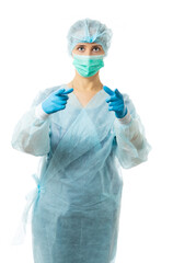 a nurse in sterile disposable clothing and a mask points at us, at the camera, up or down. isolated