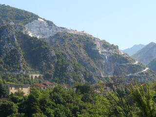 panorama on Miseglia marble quarrying basin among the green of the Apennine Mountains with Ponti di Vara bridge and the village of Bedizzano