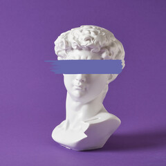 bust of david replica on a purple background ,work of michelangelo, art with antique sculpture