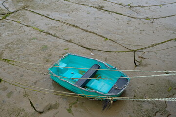 stranded boats on the seabed with low tide