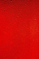 Water Drops background on the red glossy surface, Rain droplets on red texture. Natural fresh background.