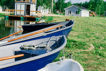 Fototapeta na wymiar Old boats on a lake, beauty world. Retro style.