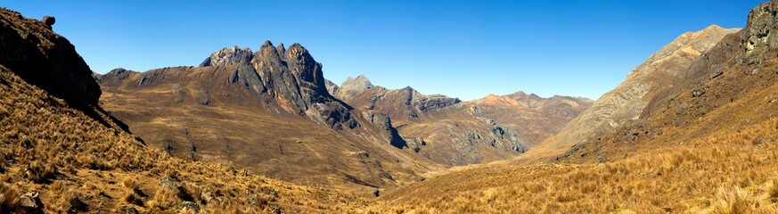 Panorama of mountains and valley in the remote Cordillera Huayhuash Circuit near Caraz in Peru.