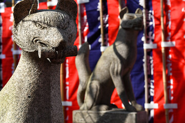 statue of two foxes, Kyoto, Japan.