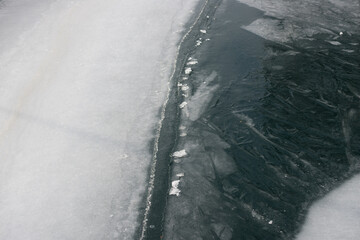 ice forms on the surface of the lake © eugen