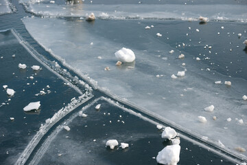 ice forms on the surface of the lake © eugen