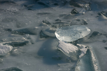 ice forms on the surface of the lake © eugen