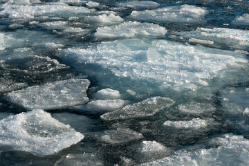ice forms on the surface of the lake © eugen
