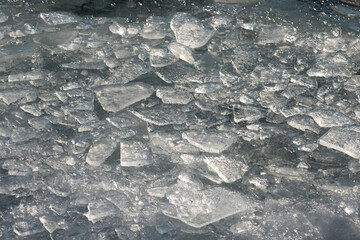 ice forms on the surface of the lake © eugen