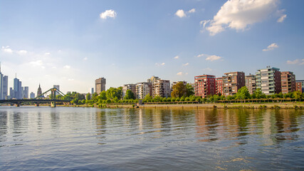 Cityscape at the bank of Main river with modern living houses construction sites in financial and...