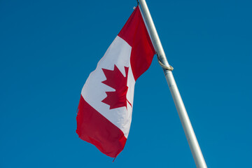 Fototapeta premium canadian flag against sky