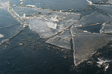 ice forms on the surface of the lake © eugen
