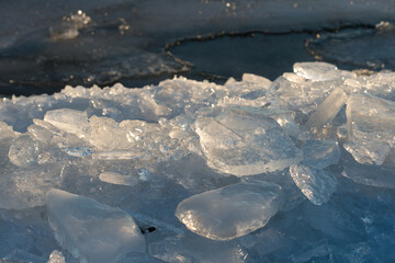 ice forms on the surface of the lake © eugen
