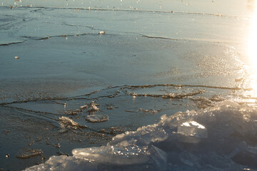 ice forms on the surface of the lake