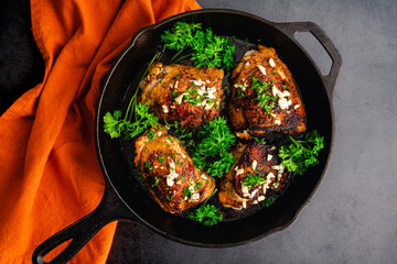 Roasted Olive Oil Chicken Thighs Mediterranean Style: Spice-rubbed chicken thighs that have been roasted in a cast-iron skillet