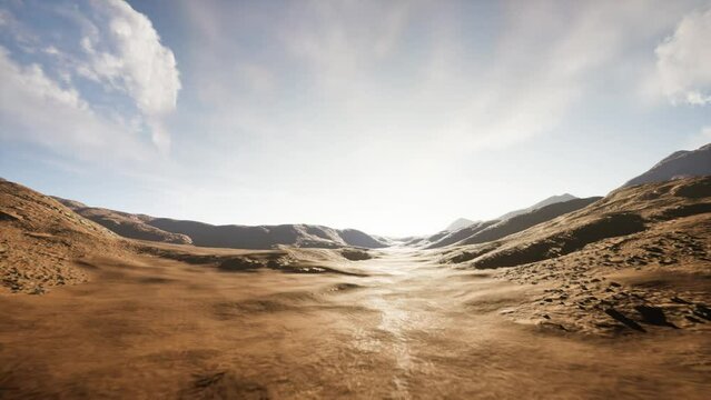 Sunset in the desert. Cinematic landscape view of the desert in drone flight