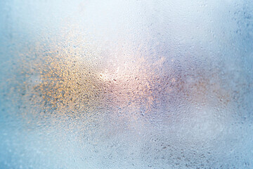 colorful dew drops on the glas