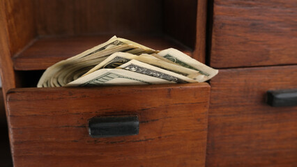 Dollars, banknotes in a box, drawer
