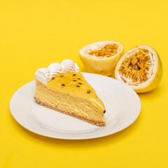 Passion fruit cheesecake, on a yellow background