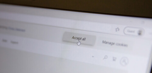 Accept all message on a computer screen, closeup view. Accept cookies, changes, email address
