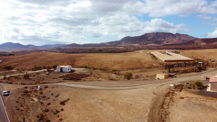 Panoramic view with mountain, desert and road in Fuerteventura