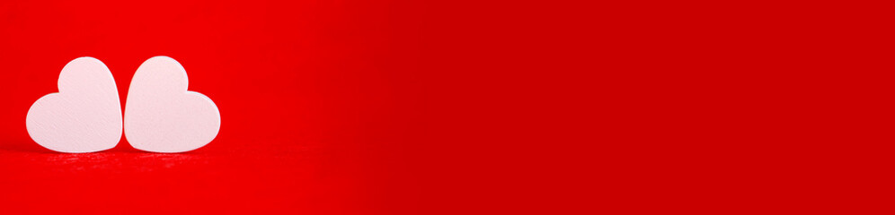 Hearts on a red background. Valentine's Day. Selective focus.