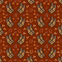 Seamless pattern with butterflies on a red background