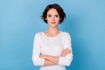 Photo of reliable representative business lady with folded arms hr promoter isolated on blue color background