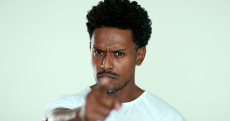 Person pointing finger upset looking to camera