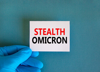 New covid-19 stealth omicron variant strain symbol. Hand in blue glove with white card. Concept words Stealth omicron. Medical and COVID-19 stealth omicron variant strain concept. Copy space.