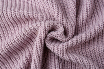 Fototapeta na wymiar Beautiful violet knitted fabric as background, top view