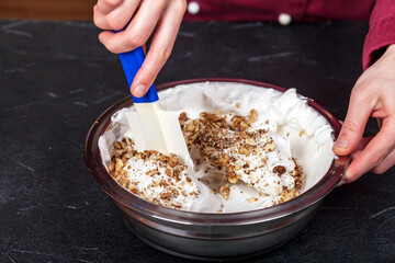 Whipped egg whites. Mix with crushed nuts