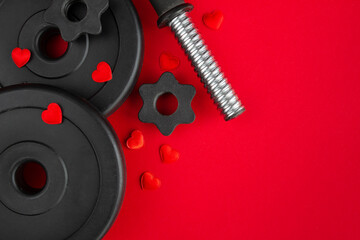 Dumbbells weight plates, decorative hearts. Love gift for Valentine's Day, marriage proposal...