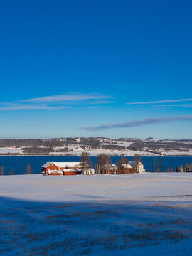 a farm by Lake Mjøsa in winter