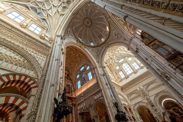 Fototapeta na wymiar The ceiling, dome, stained glass windows and cupola of the Great Mosque and Cathedral of the Mezquita in Cordoba, Spain.