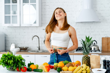 Diet specialist with vegetables on the kitchen. Professional nutritionist vitamin meal.