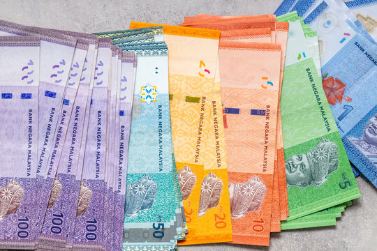 Malaysian money spread out on the table, all ringgit banknotes, concept, business economics