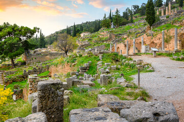 Fototapeta na wymiar An ancient hillside path among the ruins at the Greek archaeological site at Delphi, Greece.