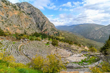 View of the ancient theater from the sacred temple complex of the Greek Oracle at Delphi, Greece at autumn.	