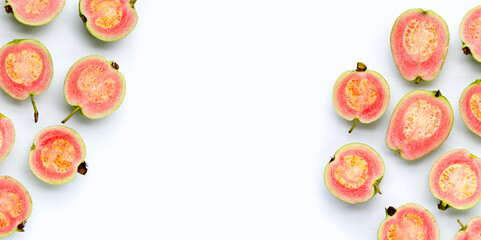 Fresh pink guava on white background.