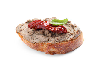 Slice of bread with delicious pate, sun dried tomato and basil isolated on white
