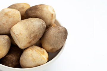 Straw mushroom on white background.