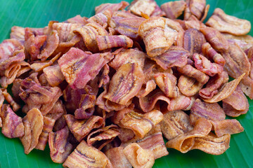 Banana slice chips on white background.