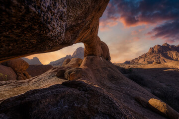 Huge cliffs at sunset among the mountains in Spitzkoppe, Namibia