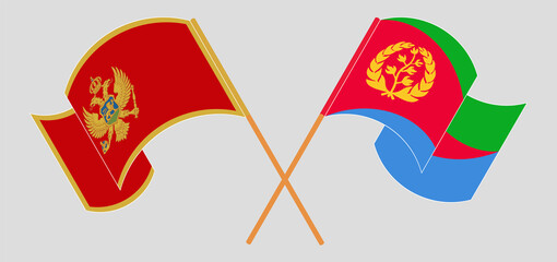 Crossed and waving flags of Montenegro and Eritrea
